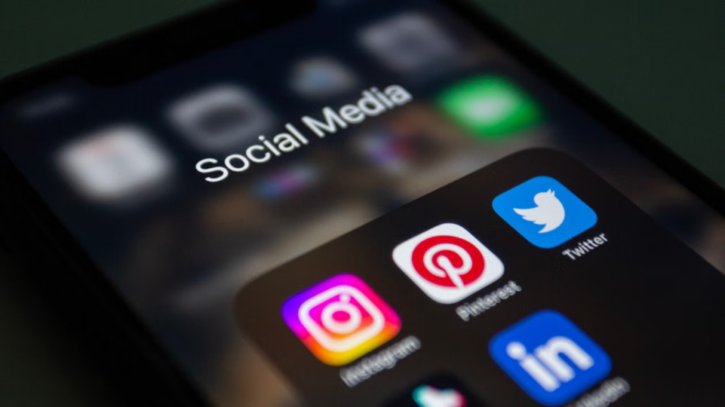A smartphone screen displaying a folder of social media apps.
